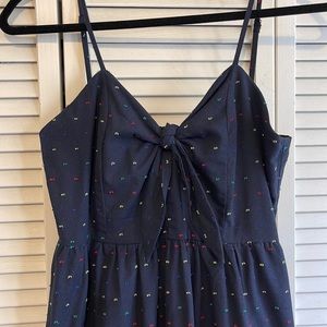 Navy blue mid length dress with tie knot at front